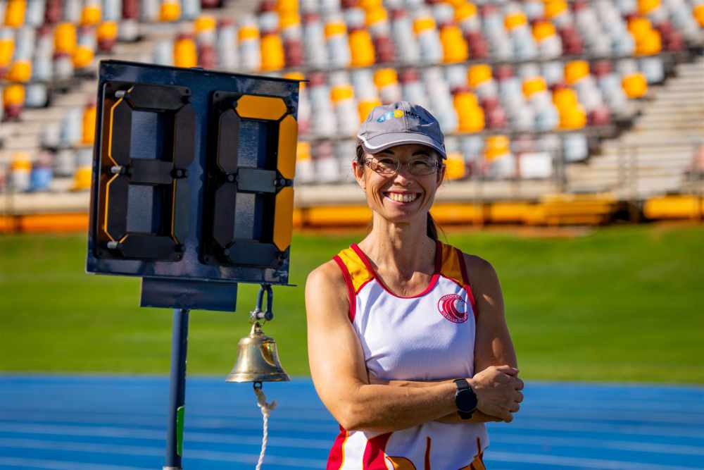 A QMA volunteer at work at a competition