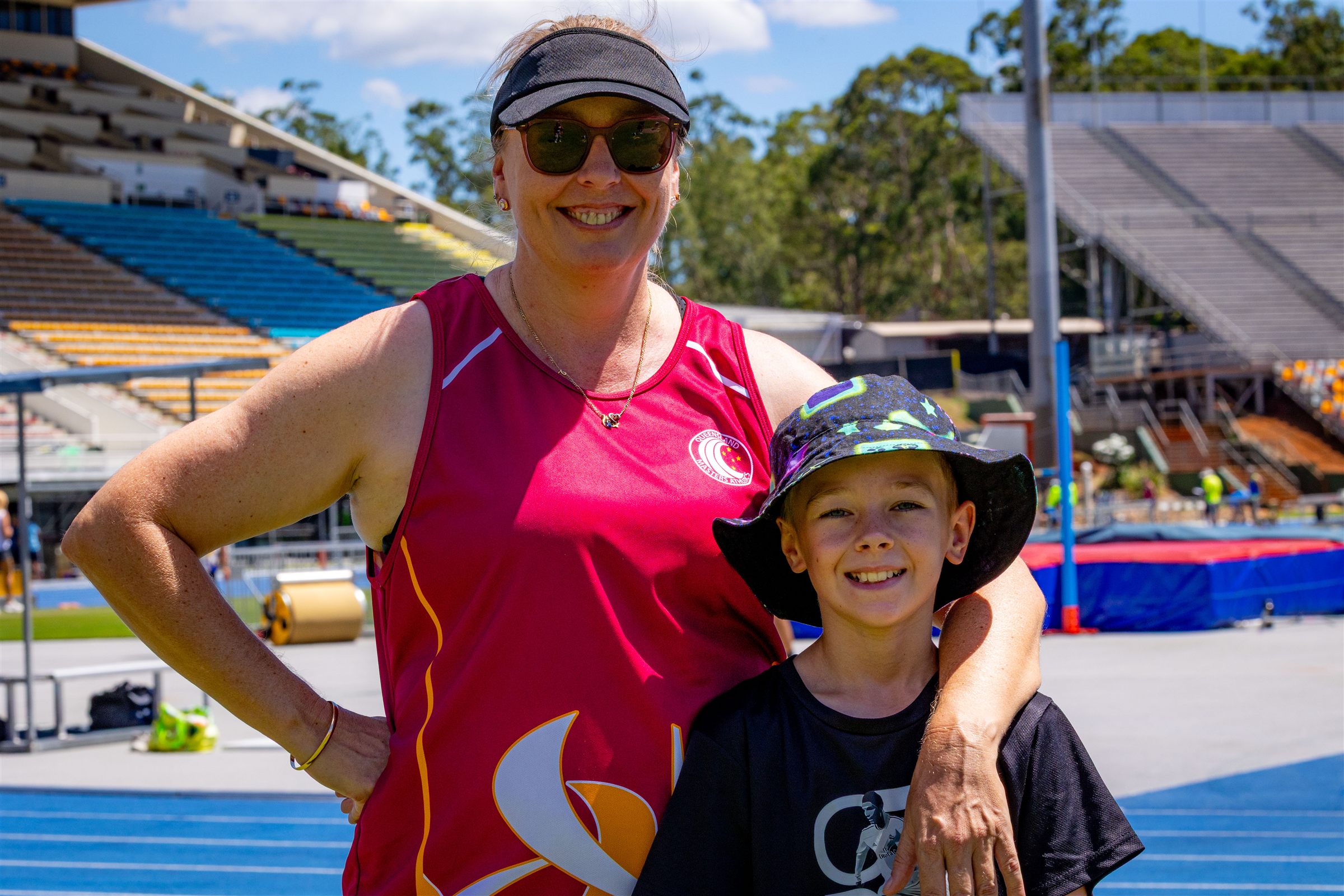 Supporters watching a Queensland Masters Athletics competition
