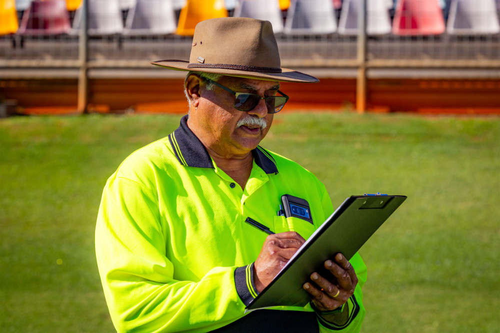 QMA officials umpiring trackside at a competition