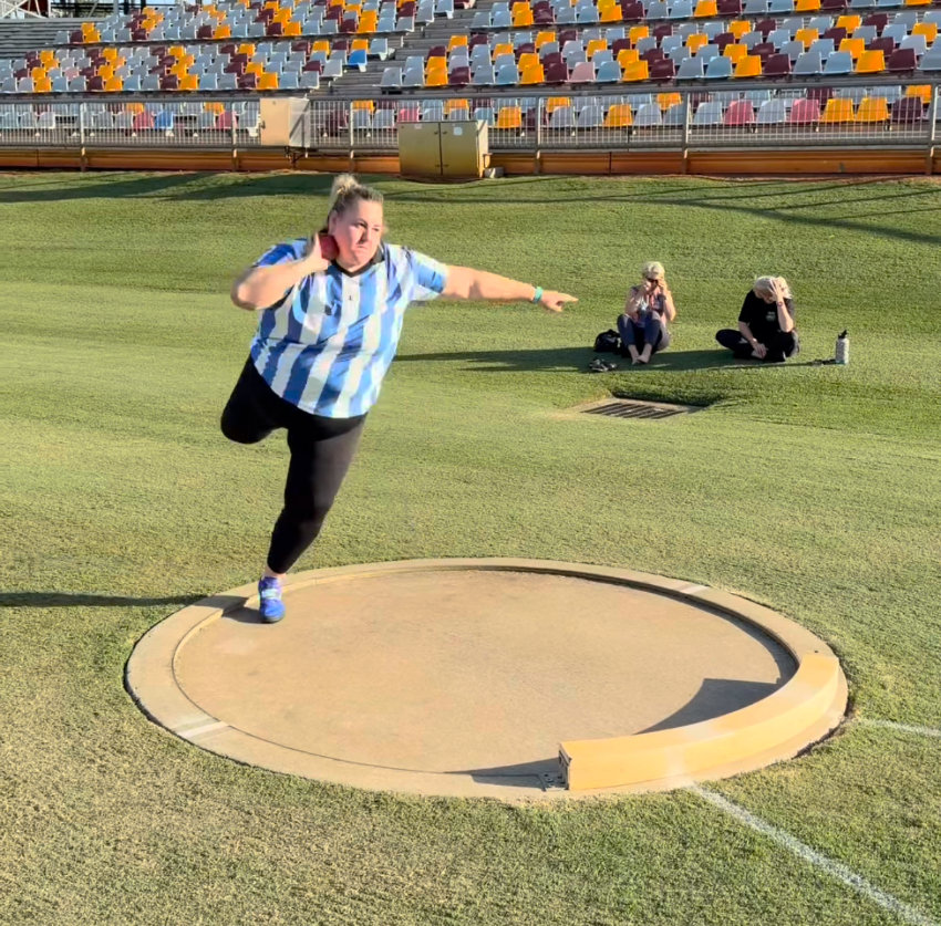 Miranda mid-turn in the shot put circle
