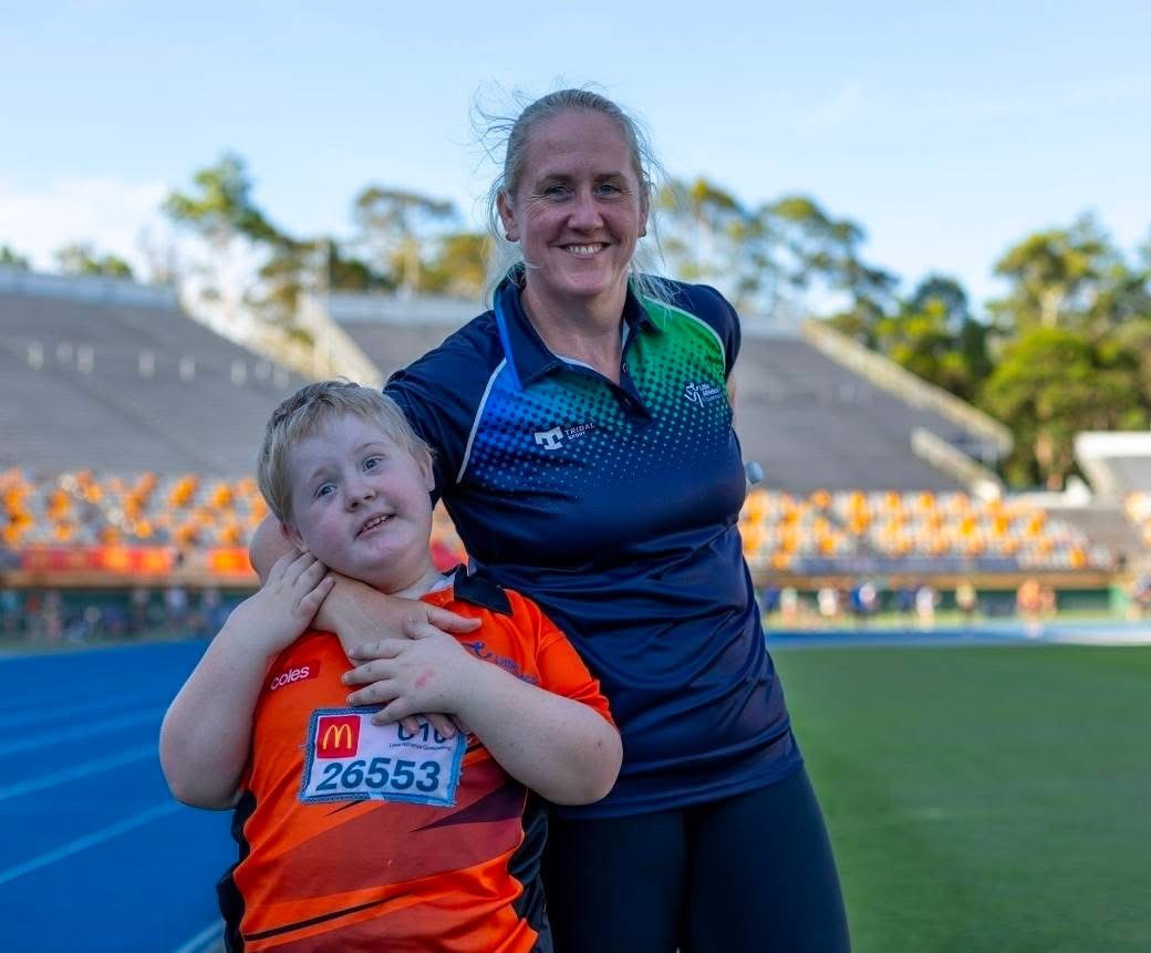 Kath with her son on the track